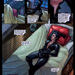 Catwoman unmasked on her bed